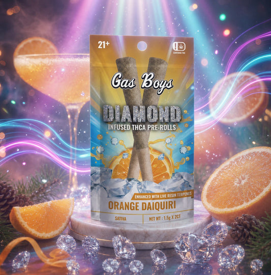 Packaging of Gas Boys Diamond Infused THCA Pre-Rolls with orange daiquiri flavor, surrounded by oranges and decorative elements.